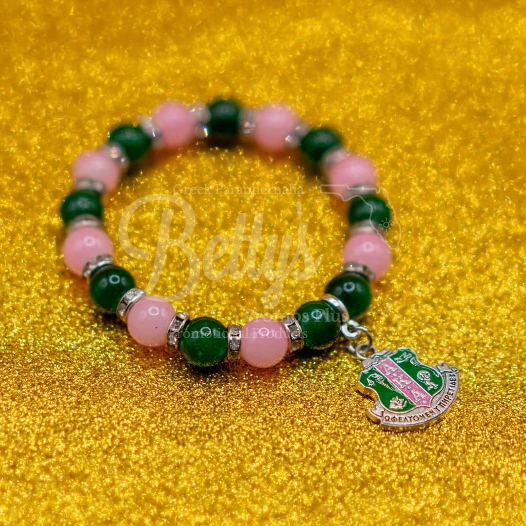 Alpha Kappa Alpha AKA Pink and Green Beaded Bracelet with Shield CharmPink-Betty's Promos Plus Greek Paraphernalia