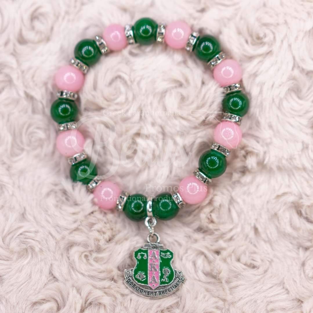 Alpha Kappa Alpha AKA Pink and Green Beaded Bracelet with Shield CharmPink-Betty's Promos Plus Greek Paraphernalia