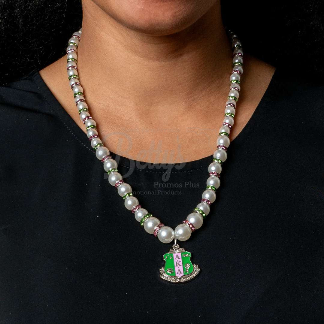 Alpha Kappa Alpha AKA Shield Pearl Necklace with Rhinestone SpacersWhite-Betty's Promos Plus Greek Paraphernalia